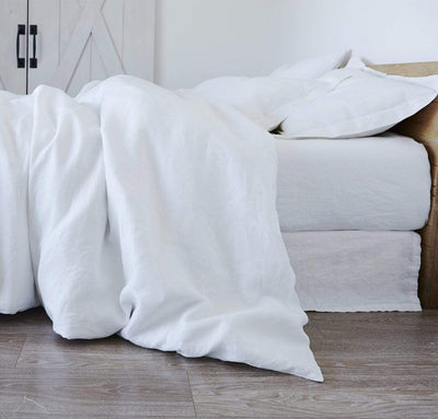 bedroom scene with 100% linen bed duvet comforter cover smooth texture lightweight linen fabric pure white color